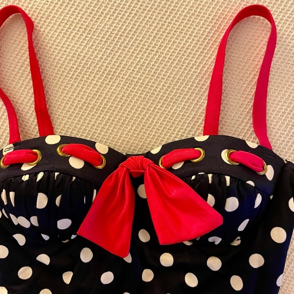 Elegant Dark Blue and White Polka Dot One Piece Swimsuit with Pink Accents - Picture 2 of 5